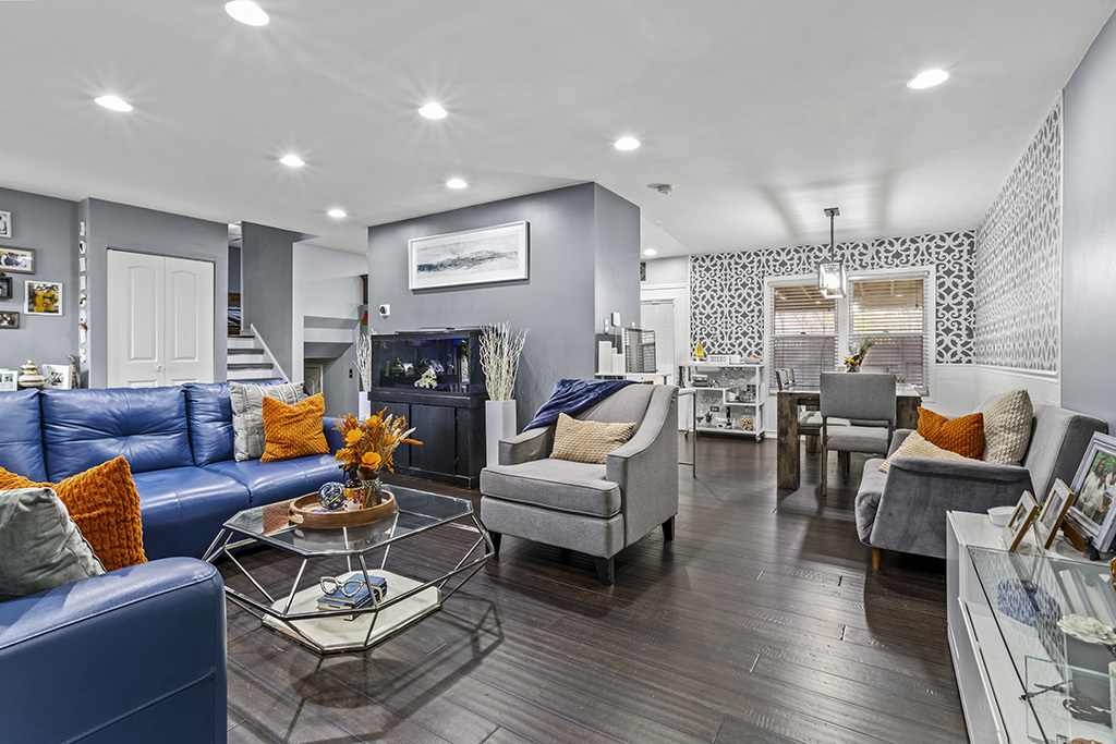 5113 Coulter Road Oak Forest, IL 60452 - Photo 4 of 13 a living room with furniture kitchen view and a wooden floor