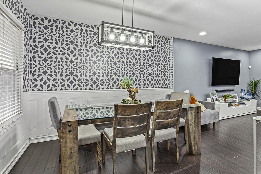 5113 Coulter Road Oak Forest, IL 60452 - Photo 5 of 13 a view of a dining room with furniture wooden floor and chandelier