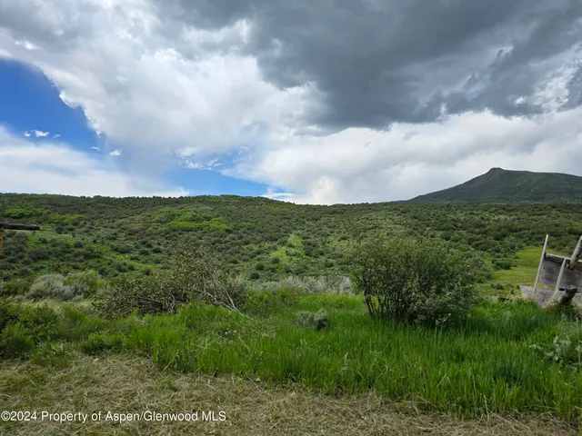 a view of a wooden fence and floor