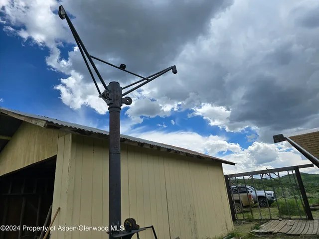 a view of a street with a yard