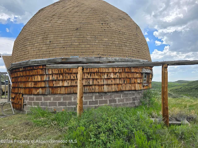 a view of a house with a mountain view