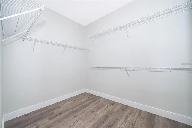 a view of a room with racks on the wall