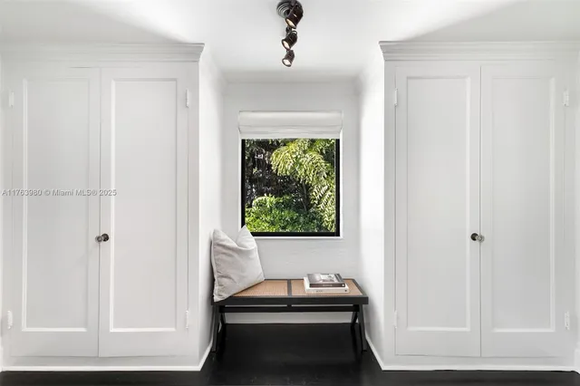 a room that has a bed and a window