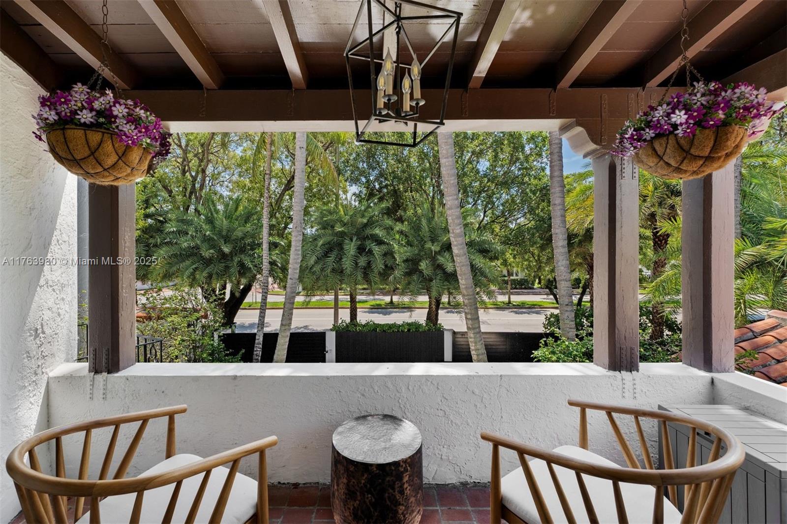 4430 Alton Road Miami Beach, FL 33140 - Photo 21 of 47 a view of a dining room with furniture window and outside view