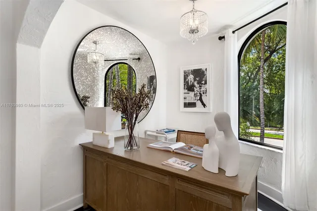 a vase of flowers sitting on a table