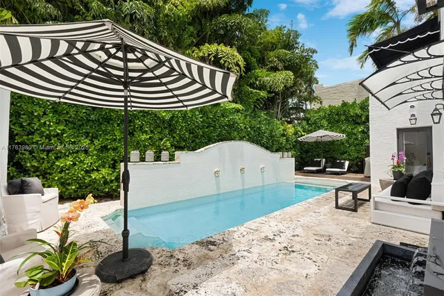 a view of a chairs and tables in the patio