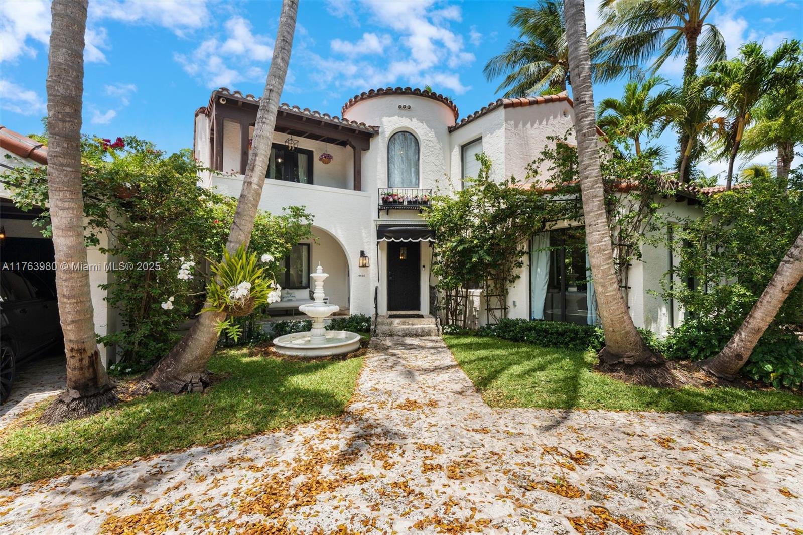 4430 Alton Road Miami Beach, FL 33140 - Photo 44 of 47 a front view of a house with garden