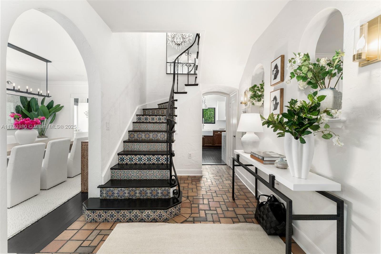 4430 Alton Road Miami Beach, FL 33140 - Photo 46 of 47 a view of entryway with paintings on the wall