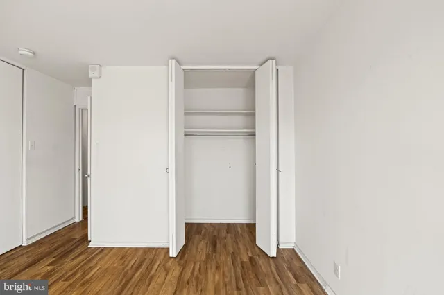 a view of a hallway with a white door