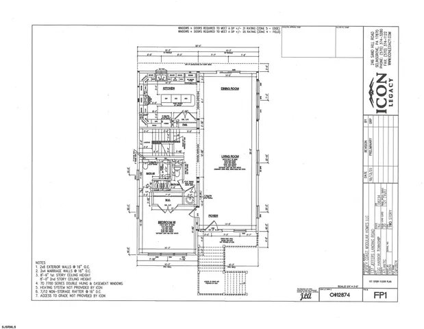 a black and white photo of a living room