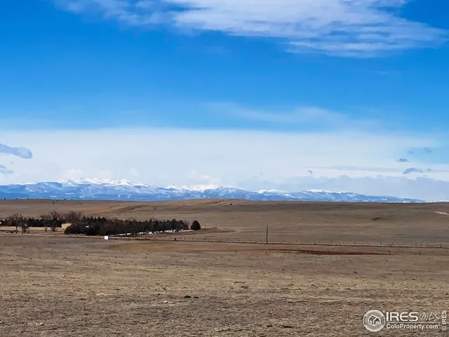 a view of an ocean and mountain