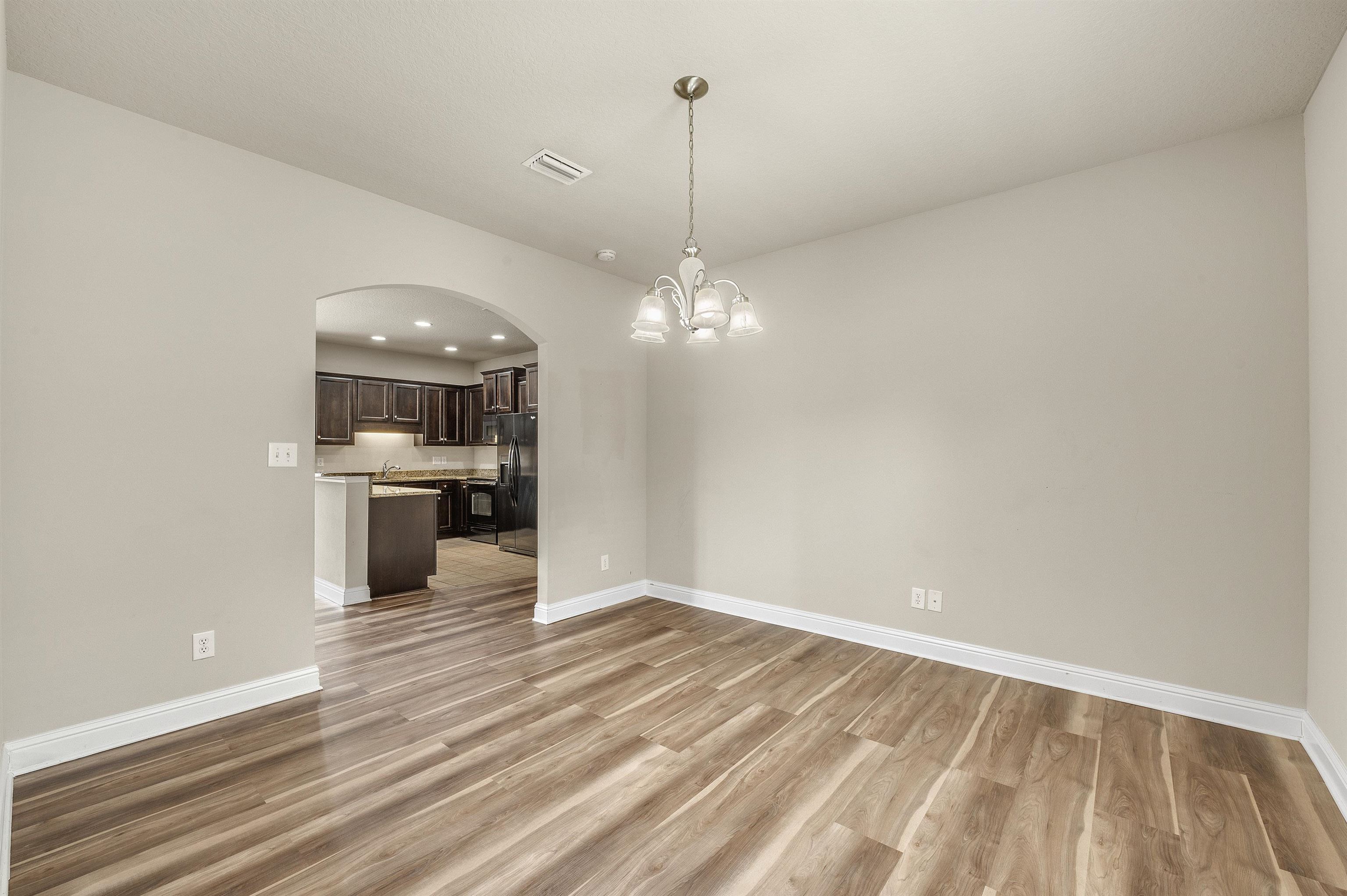 10421 Fionn Loop Daphne, AL 36526 - Photo 22 of 47 Dining to kitchen
