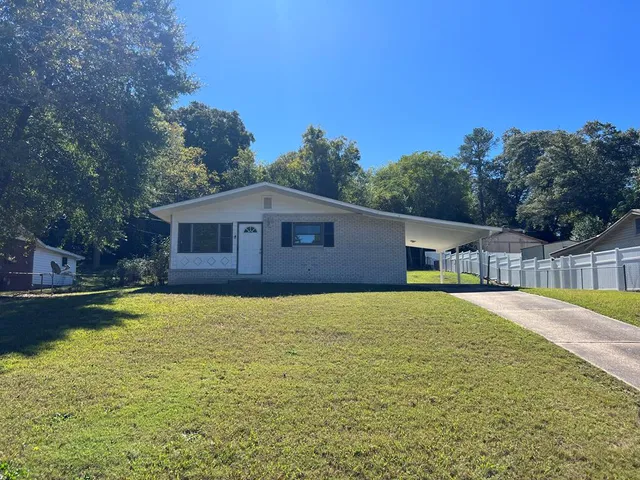 a house view with a outdoor space
