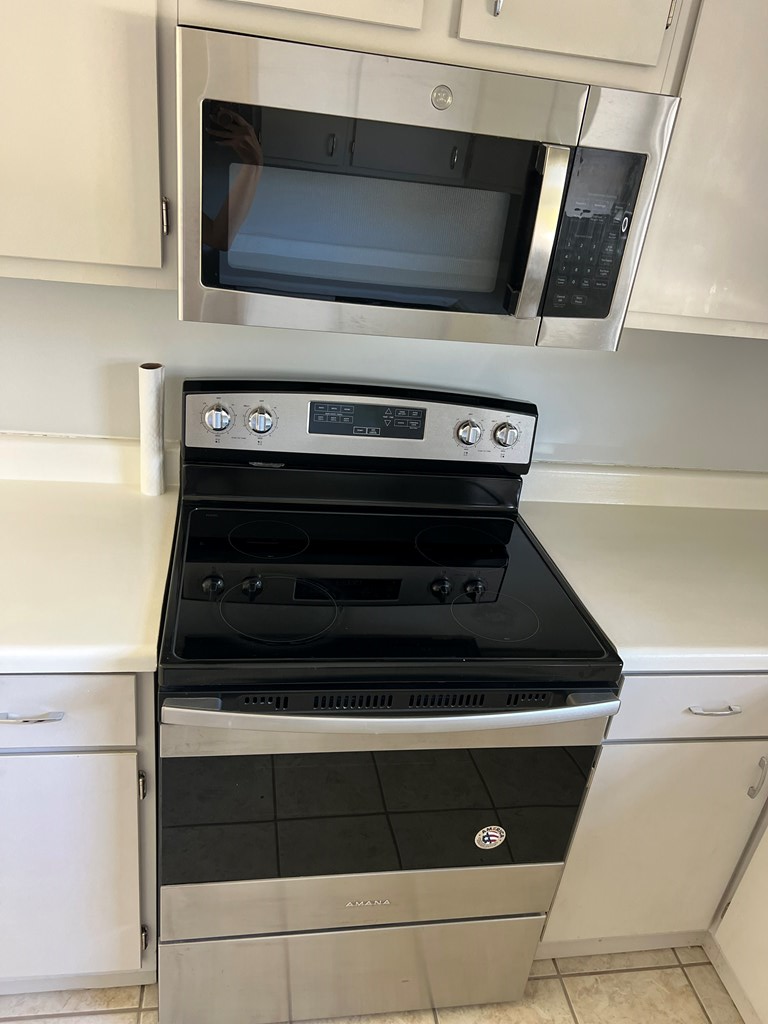 5220 Teresa Street Columbus, GA 31907 - Photo 7 of 21 a stove top oven sitting inside of a kitchen
