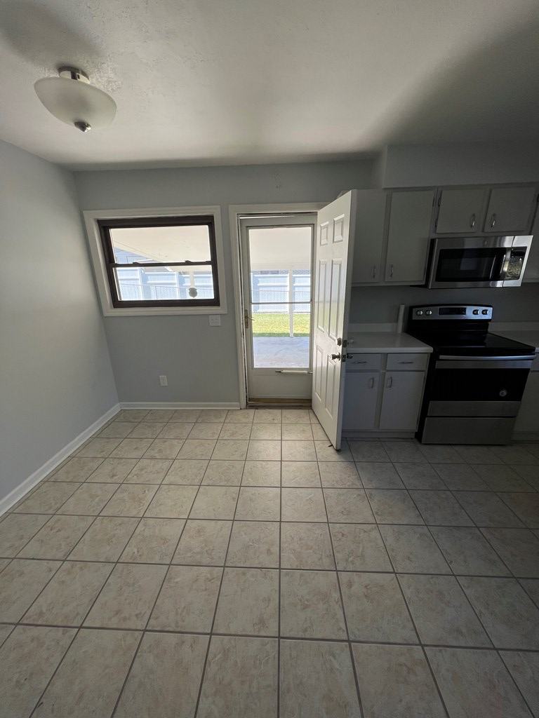 5220 Teresa Street Columbus, GA 31907 - Photo 9 of 21 a view of an empty room with a window