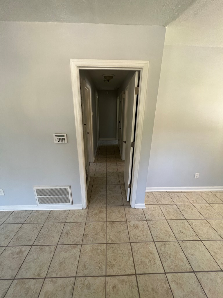 5220 Teresa Street Columbus, GA 31907 - Photo 10 of 21 a view of an empty room and window