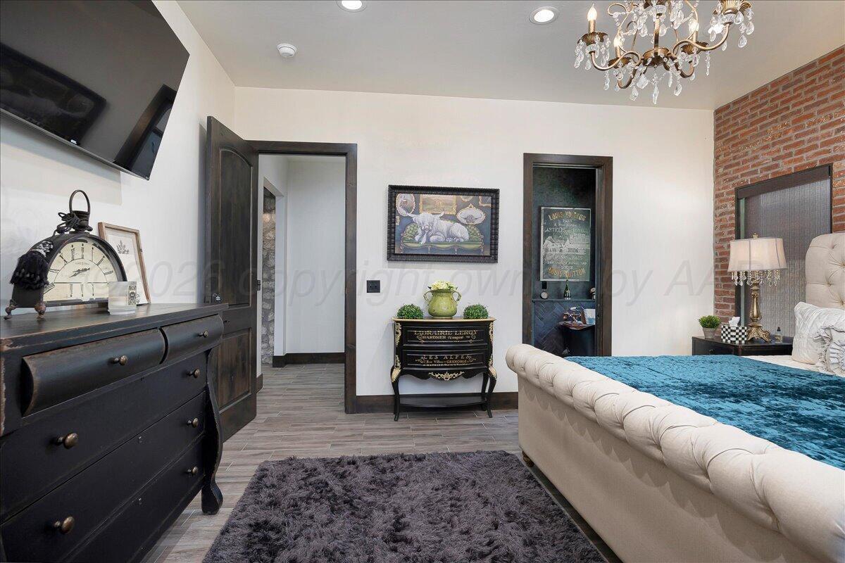 8 Cypress Point Amarillo, TX 79124 - Photo 19 of 43 a living room with furniture and a flat screen tv