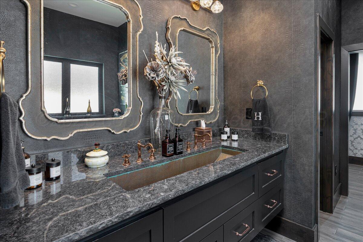 8 Cypress Point Amarillo, TX 79124 - Photo 20 of 43 a bathroom with a granite countertop sink a potted plant and mirror