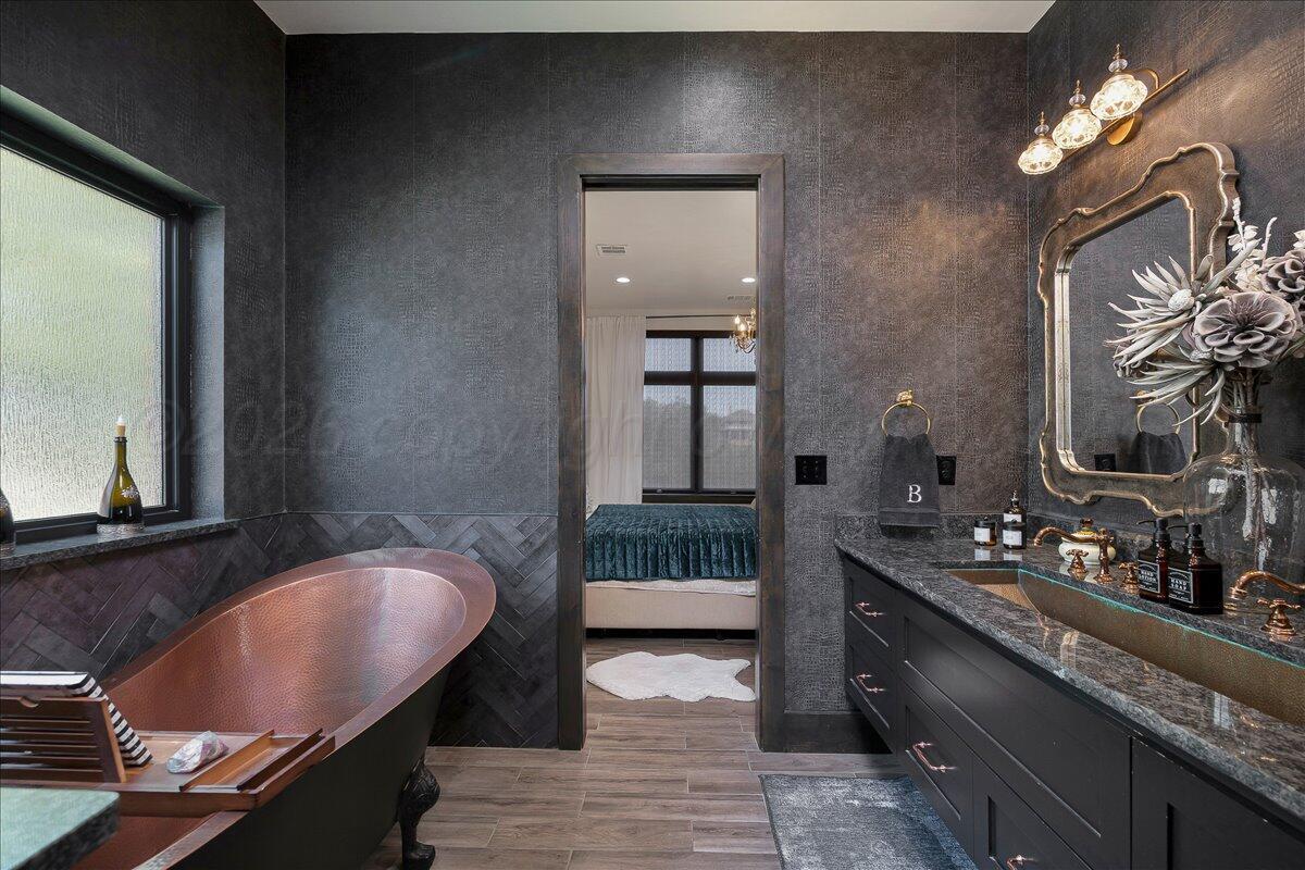 8 Cypress Point Amarillo, TX 79124 - Photo 21 of 43 a bathroom with mirror and sink
