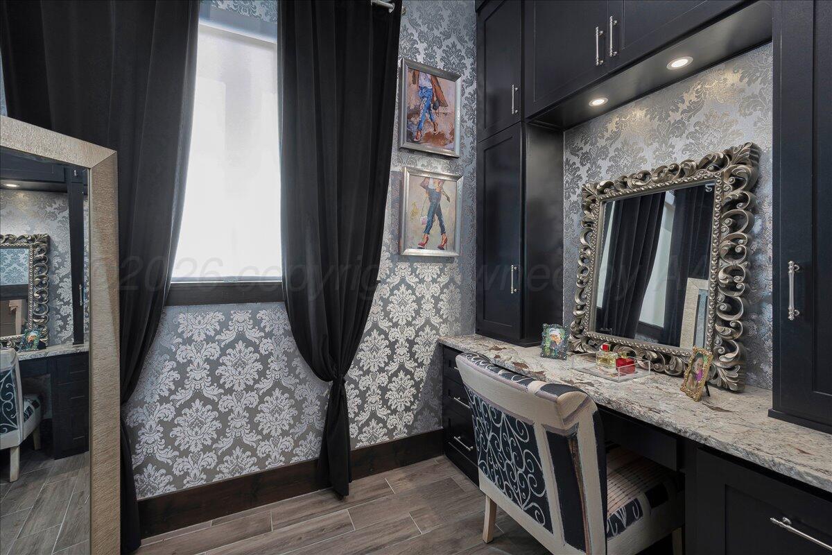 8 Cypress Point Amarillo, TX 79124 - Photo 24 of 43 a bathroom with a double vanity sink and a mirror