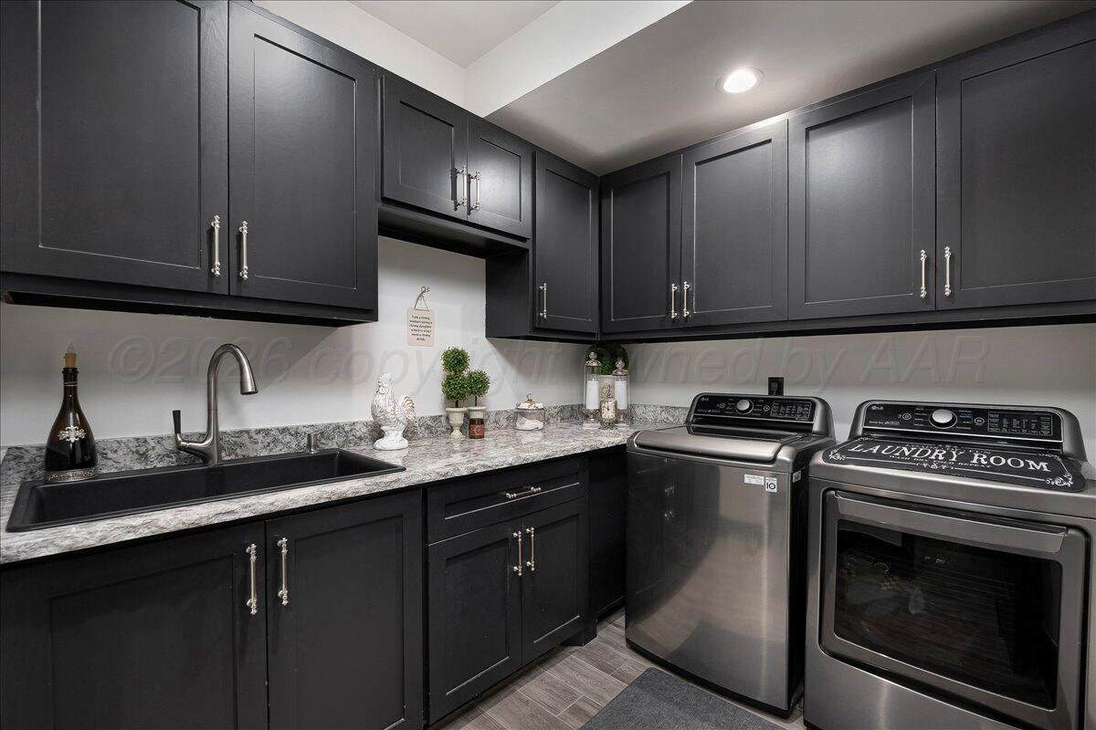 8 Cypress Point Amarillo, TX 79124 - Photo 35 of 43 a kitchen with stainless steel appliances granite countertop a sink a stove and cabinets