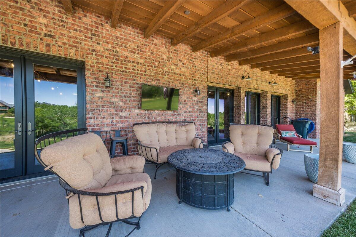 8 Cypress Point Amarillo, TX 79124 - Photo 38 of 43 a view of a patio with couple of chairs and a couch
