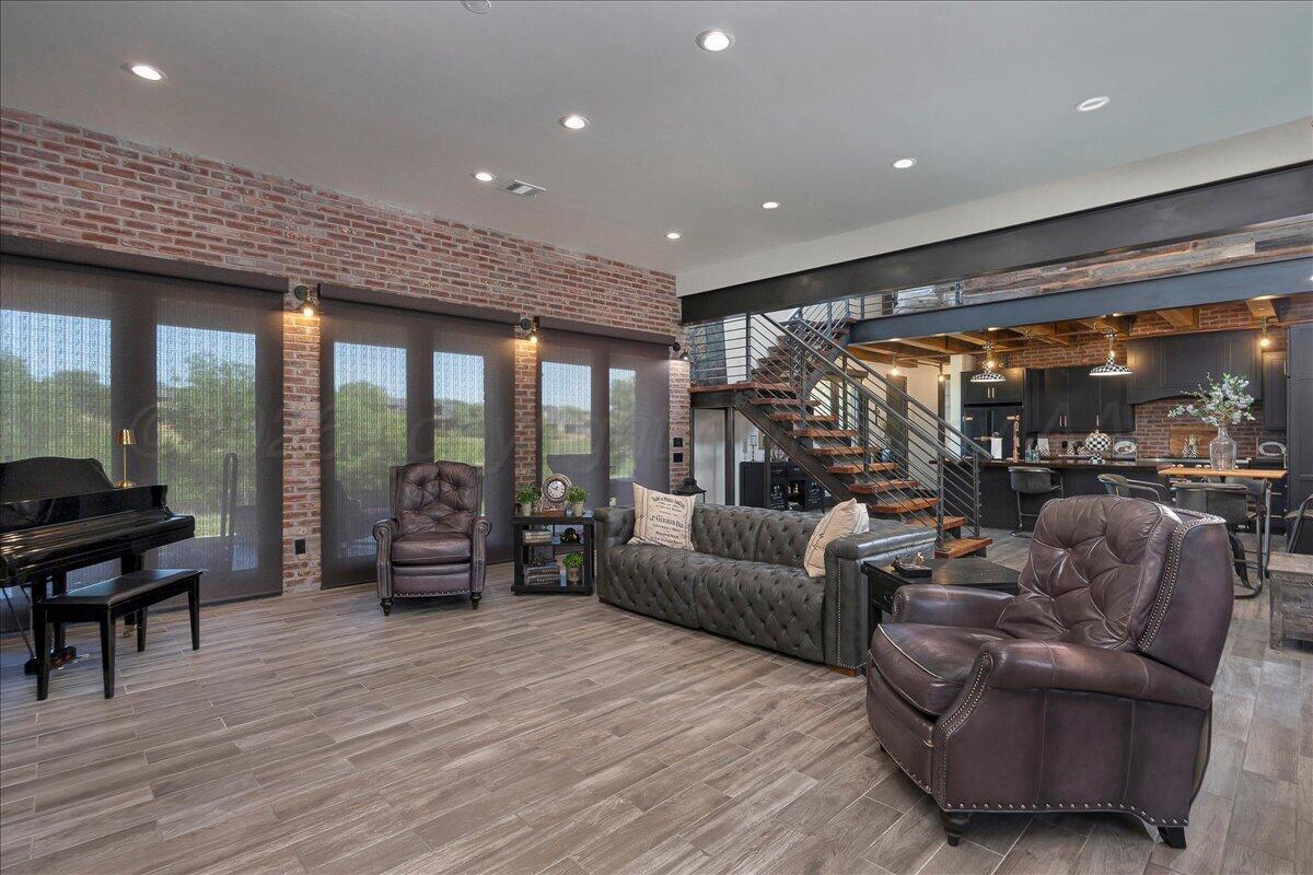 8 Cypress Point Amarillo, TX 79124 - Photo 8 of 43 a living room with furniture and a wooden floor