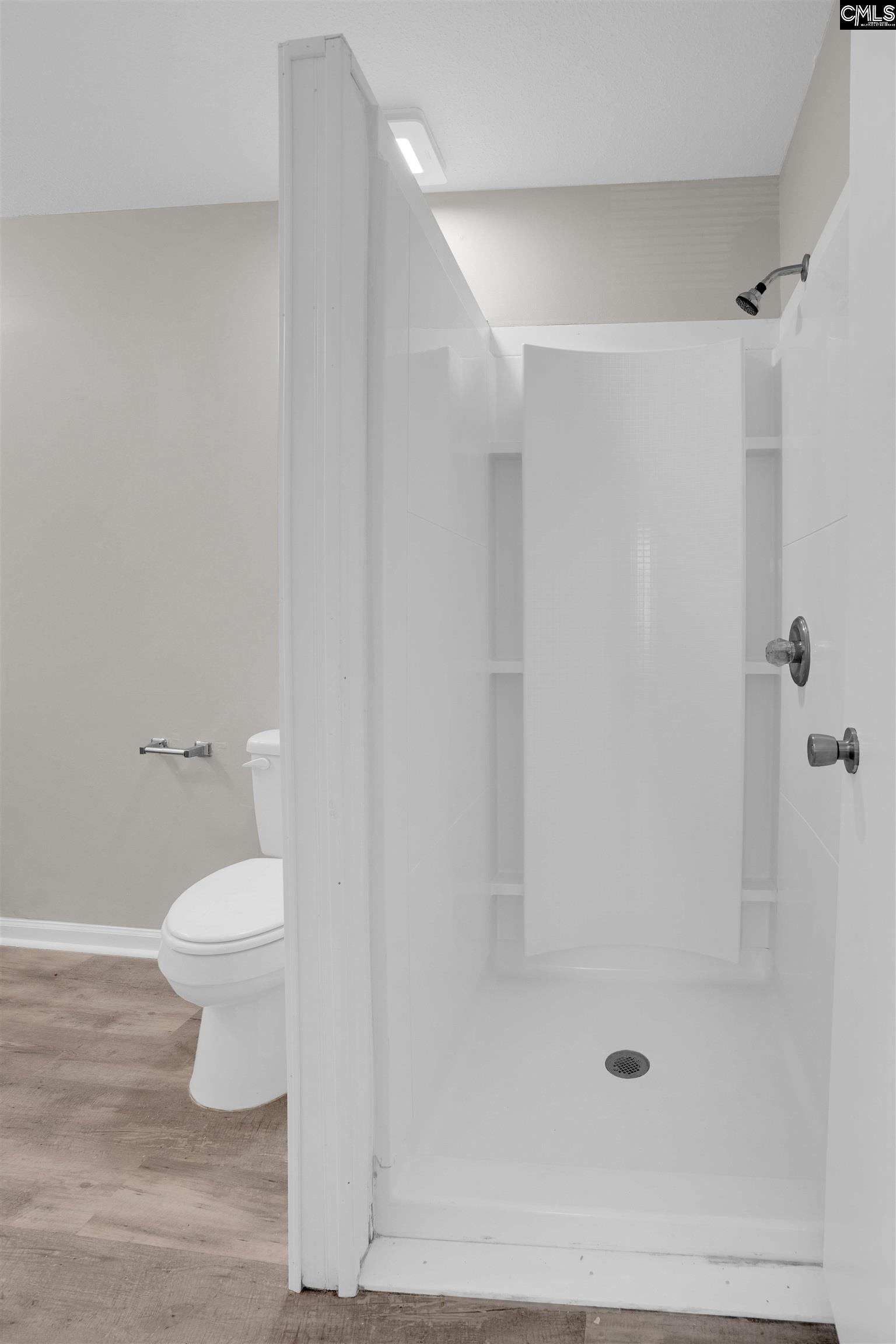 2620 Pleasant Ridge Drive Columbia, SC 29209 - Photo 32 of 37 a bathroom with a toilet and a shower