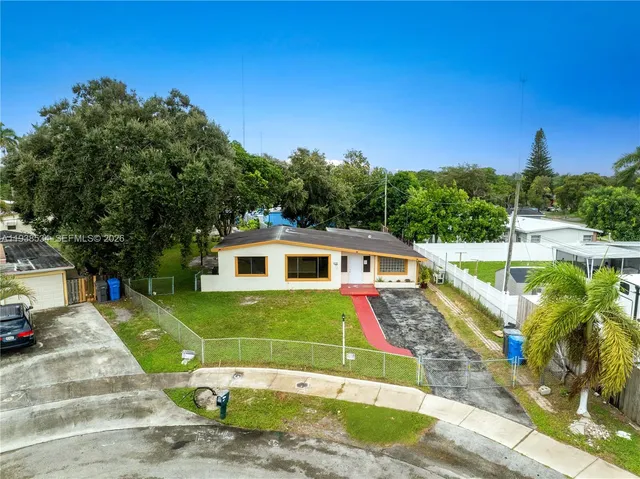a view of house with backyard and entertaining space
