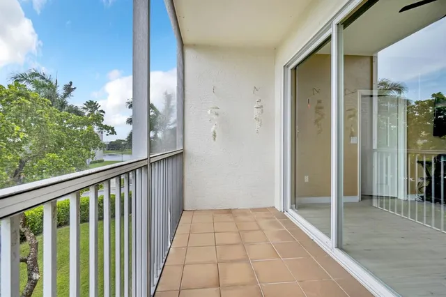 a view of livingroom with hardwood floor and hallway