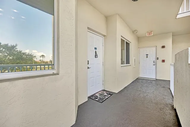 a view of a street with cars