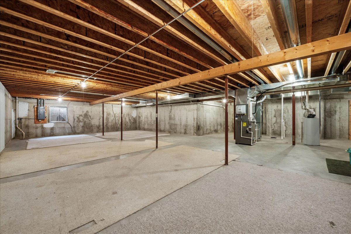 11605 Ellwood Greens Road Genoa, IL 60135 - Photo 19 of 25 a view of a hall with wooden floor