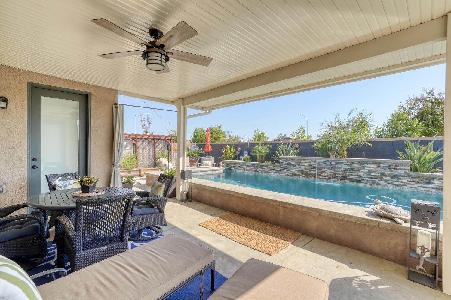 3048 Poe Avenue Clovis, CA 93619 - Photo 39 of 56 a view of a dining room with furniture window and outside view