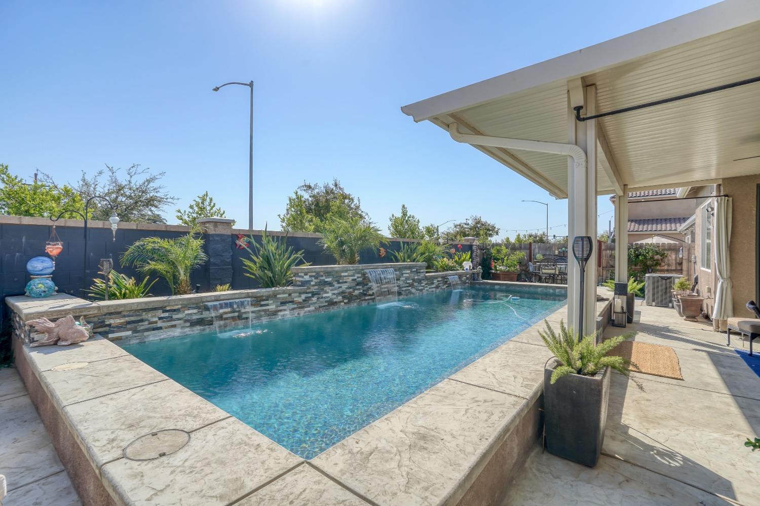 3048 Poe Avenue Clovis, CA 93619 - Photo 43 of 56 a view of a lake with a ocean view