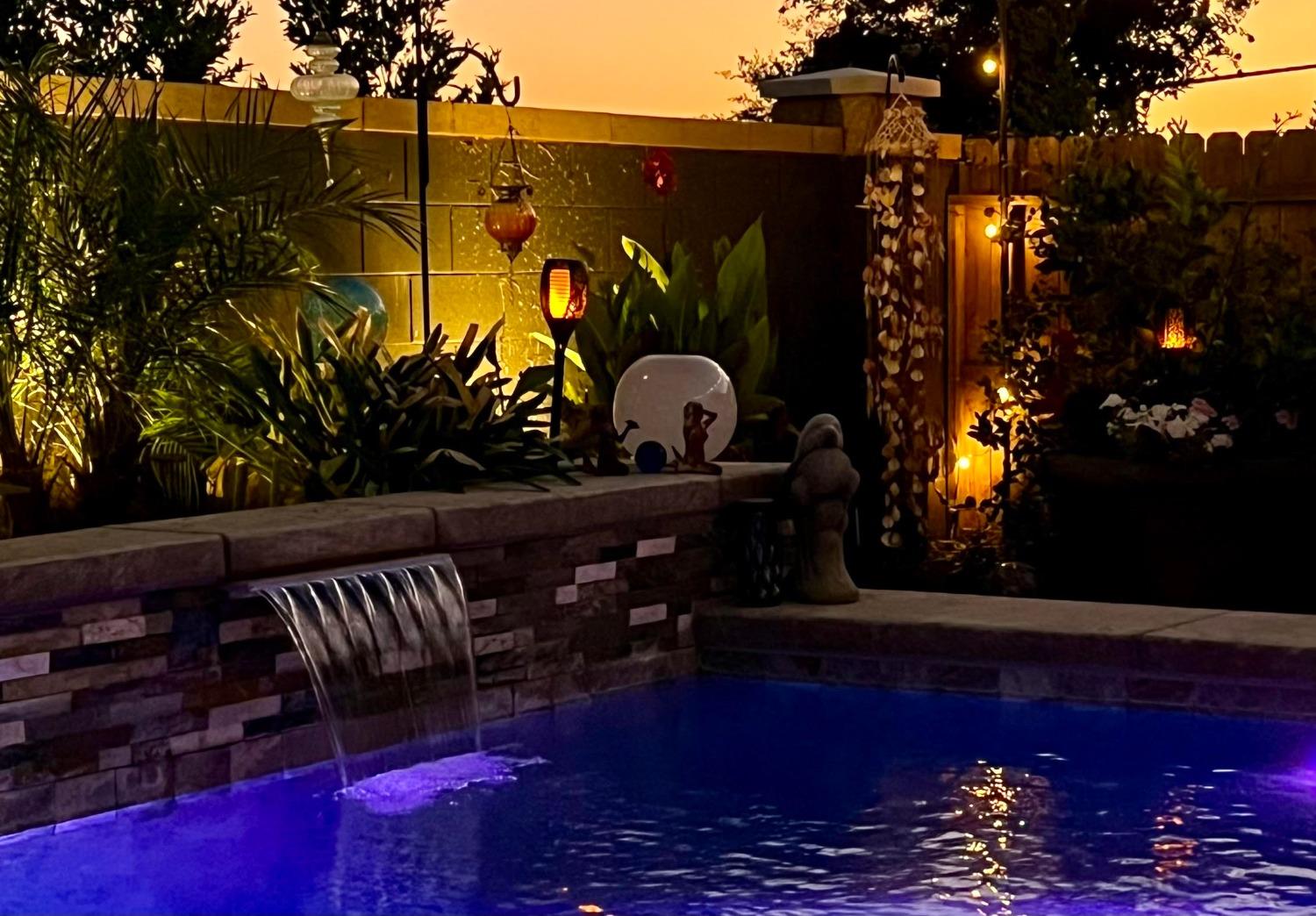 3048 Poe Avenue Clovis, CA 93619 - Photo 48 of 56 a view of a balcony with many potted plants