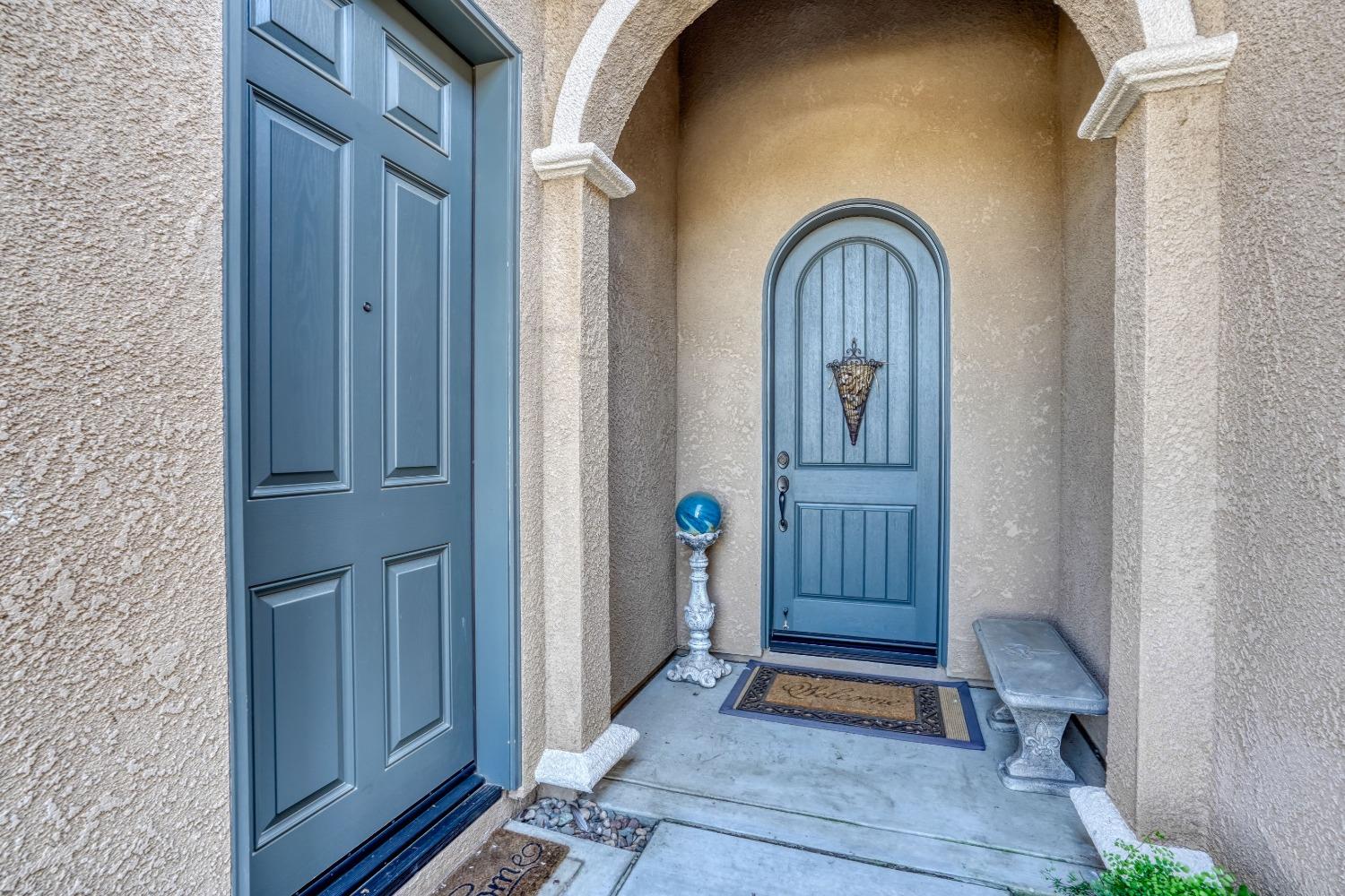 3048 Poe Avenue Clovis, CA 93619 - Photo 5 of 56 a view of front door with wooden door