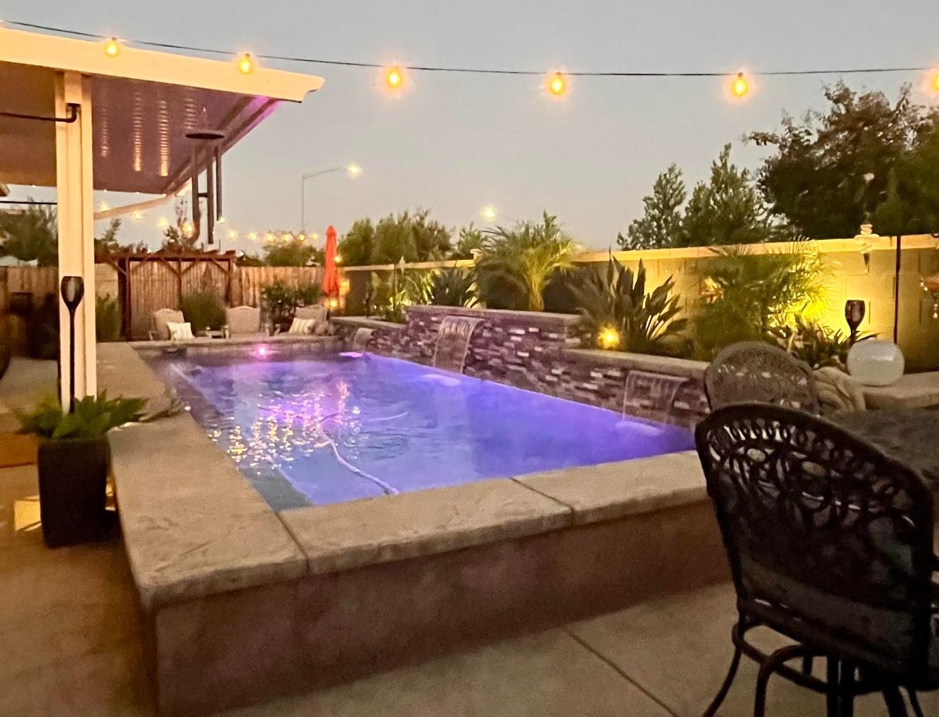 3048 Poe Avenue Clovis, CA 93619 - Photo 52 of 56 a view of a chairs and table on the terrace