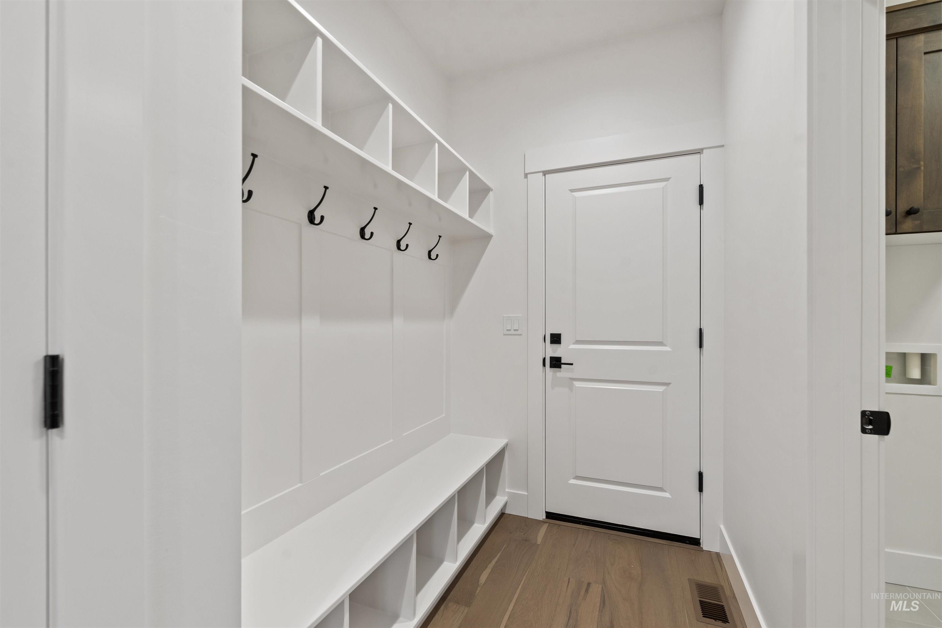 2129 East Blakehurst Street Kuna, ID 83634 - Photo 25 of 34 Mudroom with wood finished floors and baseboards