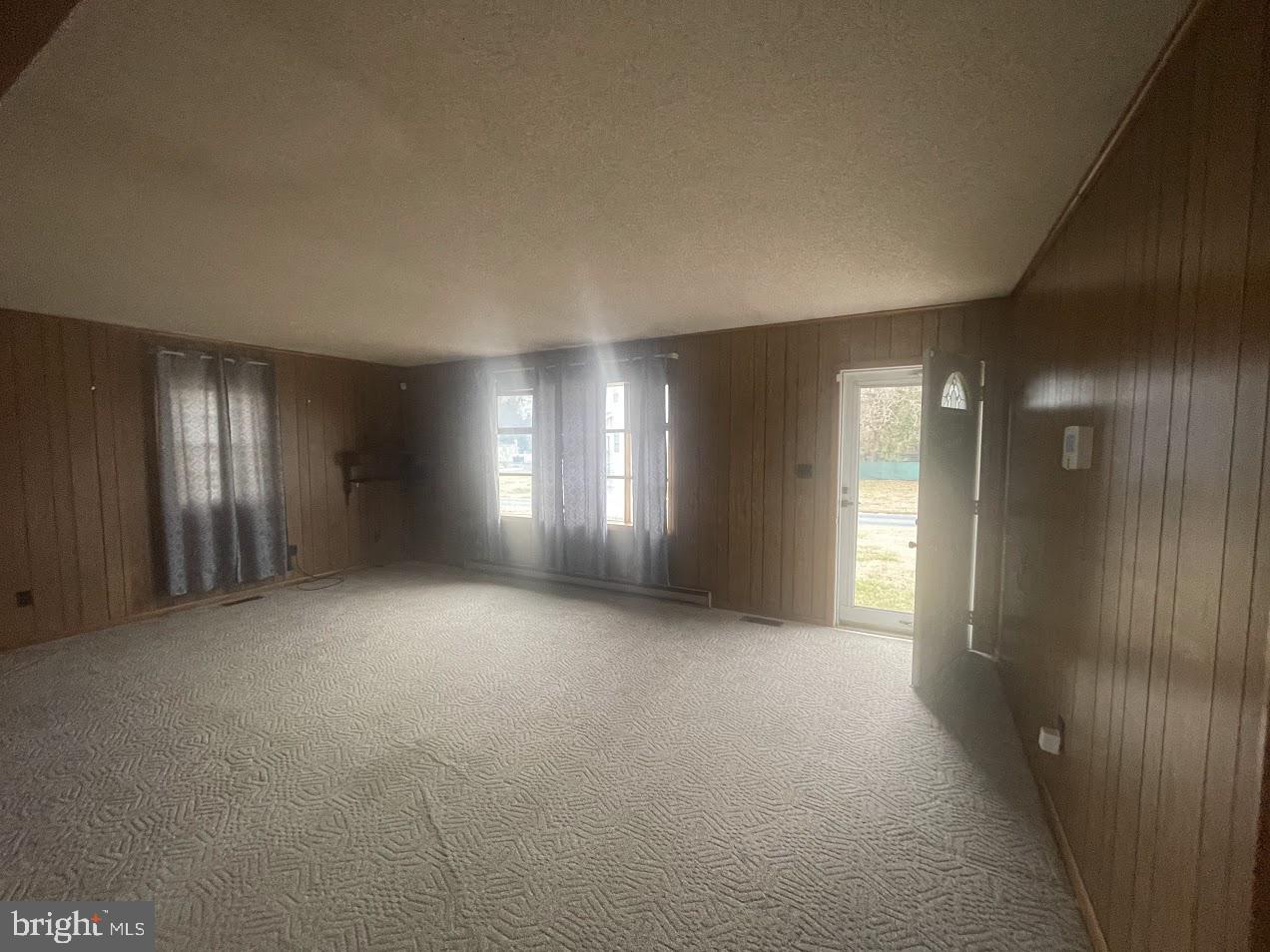 204 East Adams Street Georgetown, DE 19947 - Photo 16 of 18 a view of empty room with windows