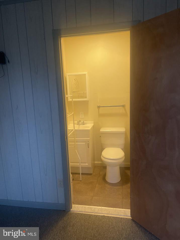 204 East Adams Street Georgetown, DE 19947 - Photo 17 of 18 a bathroom with a toilet and a shower