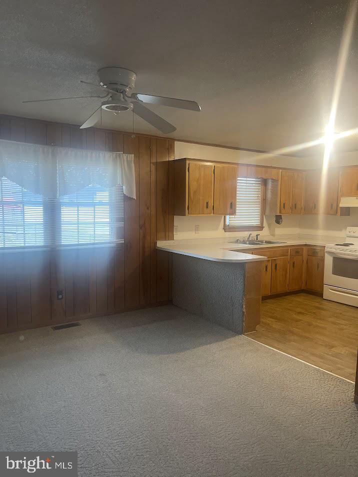 204 East Adams Street Georgetown, DE 19947 - Photo 5 of 18 a large kitchen with a cabinets