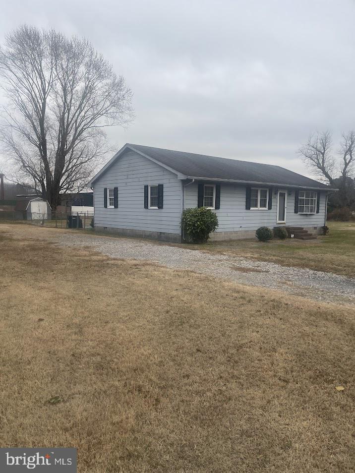 204 East Adams Street Georgetown, DE 19947 - Photo 6 of 18 a house view with a garden space