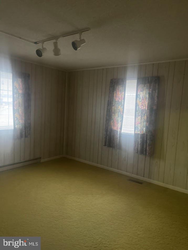 204 East Adams Street Georgetown, DE 19947 - Photo 10 of 18 an empty room with windows