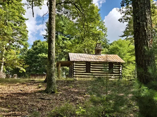 a view of a lake with a big yard