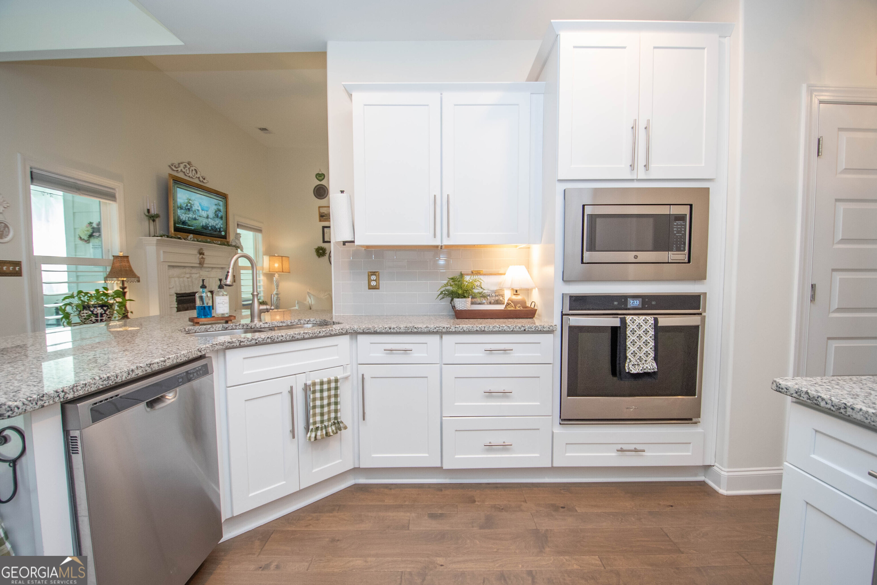 6 Delaware Way Newnan, GA 30265 - Photo 18 of 42 a kitchen with cabinets appliances and a sink