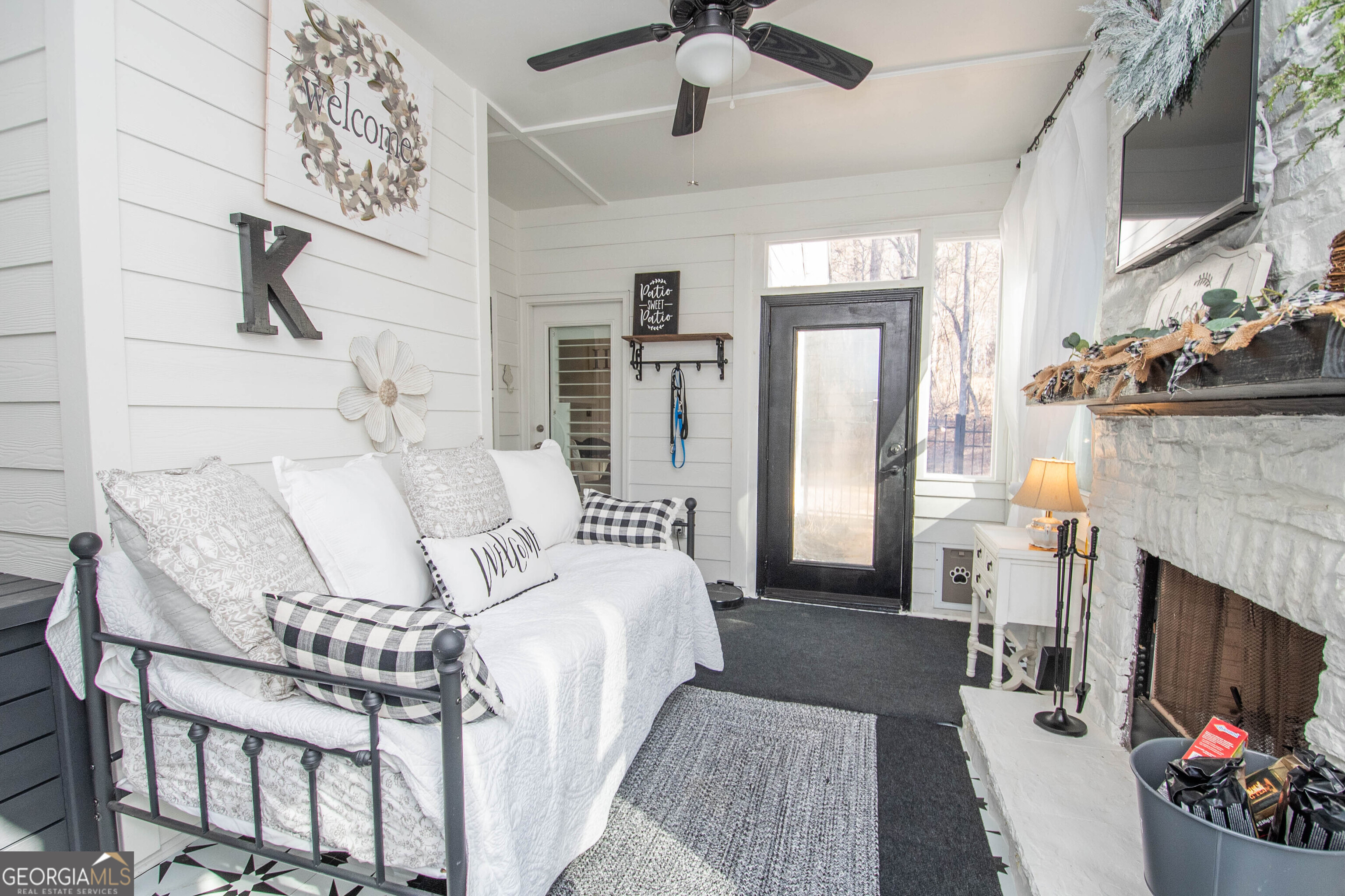 6 Delaware Way Newnan, GA 30265 - Photo 23 of 42 a living room with furniture fireplace and flat screen tv