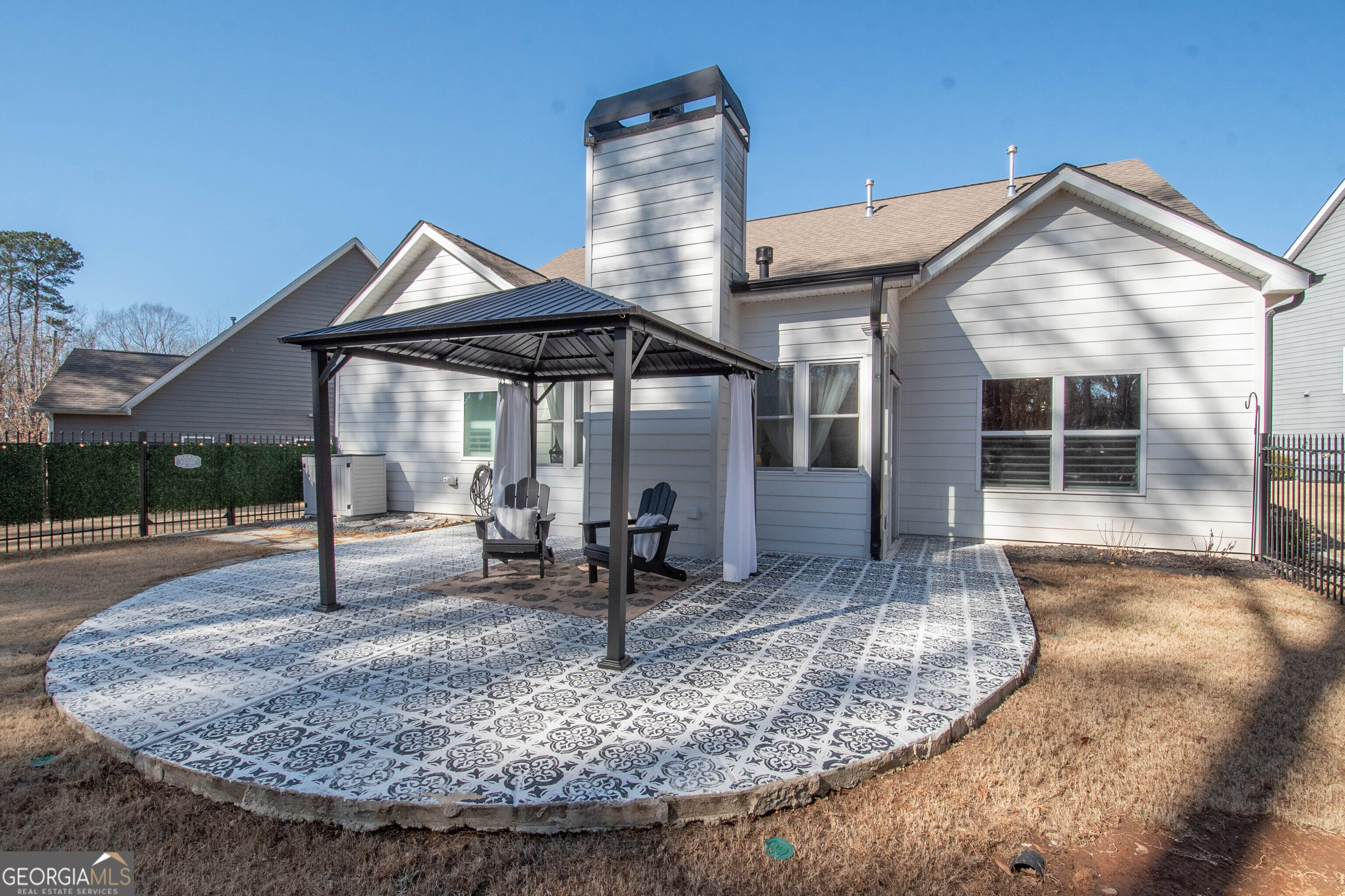 6 Delaware Way Newnan, GA 30265 - Photo 36 of 42 a view of a house with entrance gate