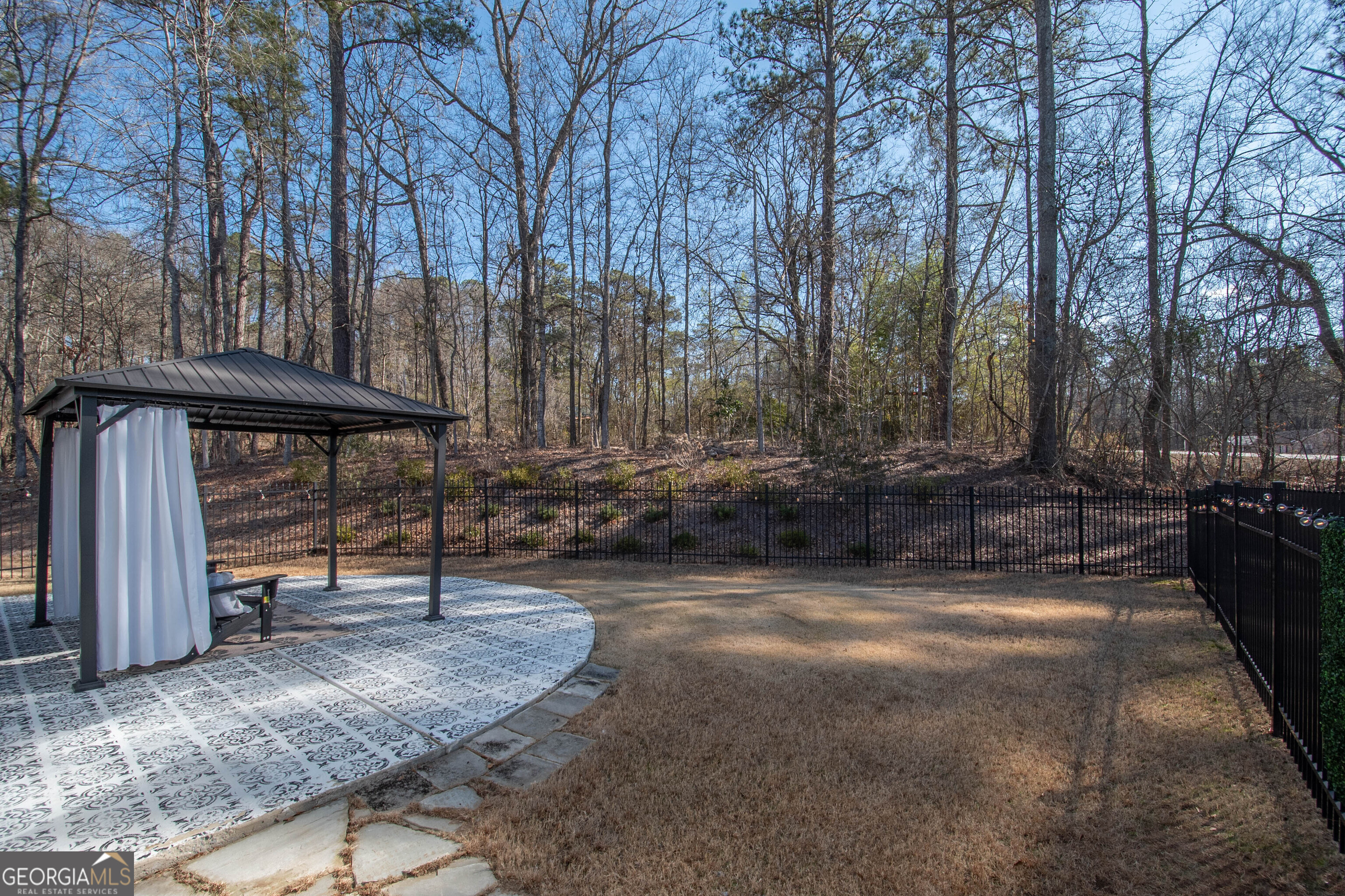 6 Delaware Way Newnan, GA 30265 - Photo 38 of 42 a view of outdoor space with deck and trees