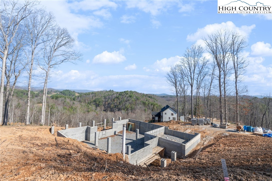 403 Autumn Leaf Way Crumpler, NC 28617 - Photo 11 of 16 a view of a terrace with sitting area