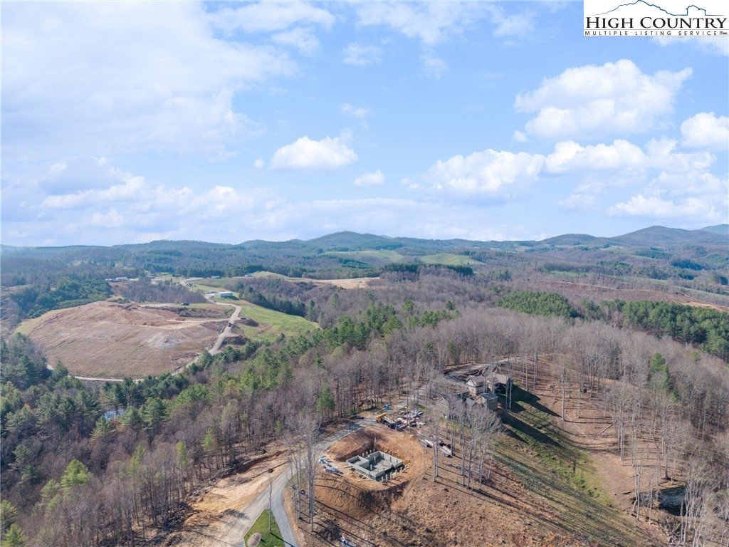 403 Autumn Leaf Way Crumpler, NC 28617 - Photo 15 of 16 an aerial view of a house with mountain view